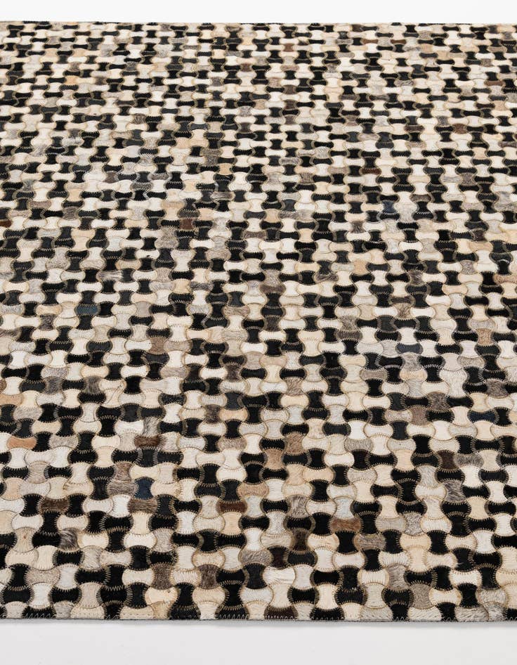 Detail image of  5' 1 x 7' 11 Cowhide - Patchwork Rug