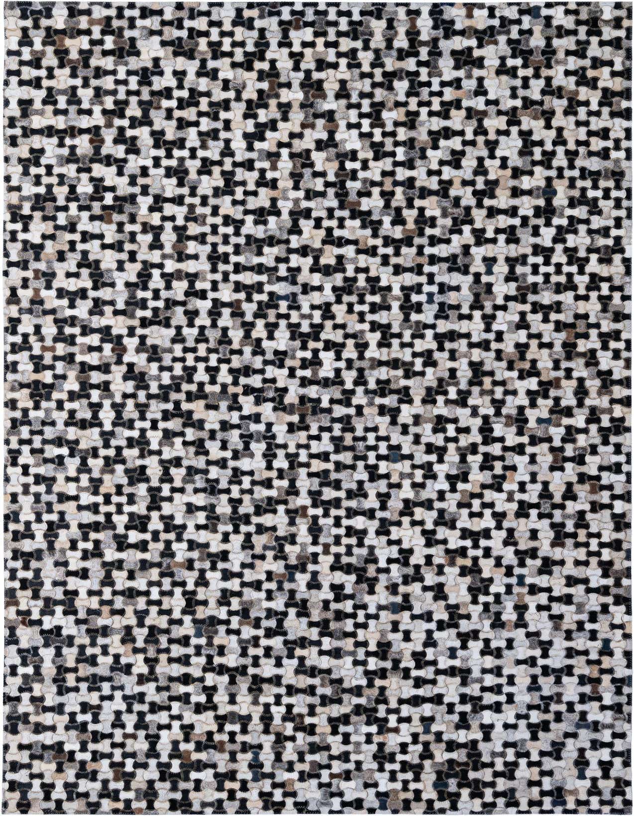 A 5x8 rectangular Cowhide Patchwork rug featuring a modern geometric pattern in multi-colored natural cowhide and leather.