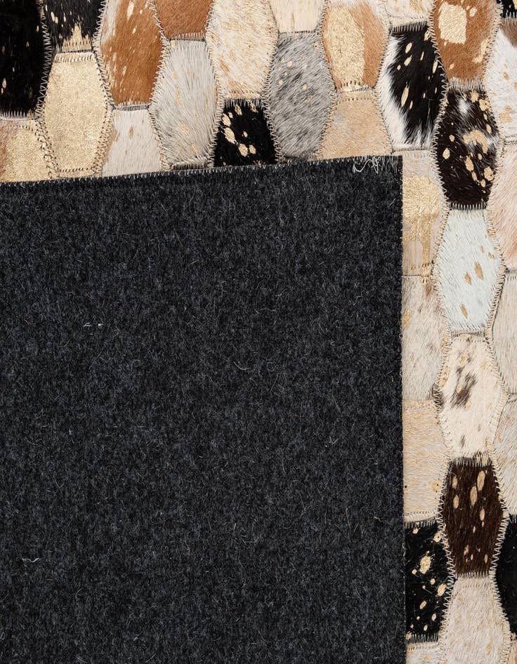 Detail image of  5' 2 x 8' Cowhide - Patchwork Rug