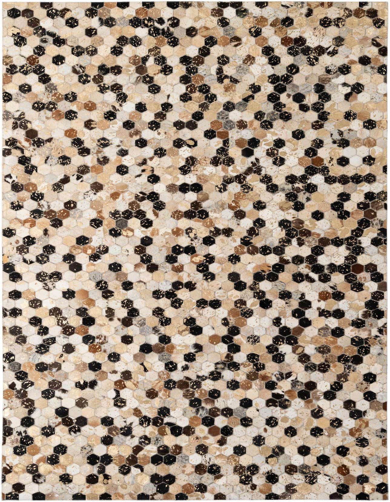 A 5x8 rectangular Cowhide - Patchwork rug featuring a modern pattern of multi-colored hexagonal cowhide and leather pieces, suitable for a living room.