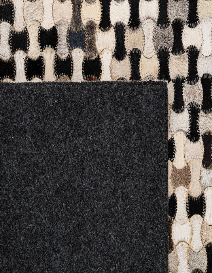 Detail image of  5' 1 x 8' Cowhide - Patchwork Rug