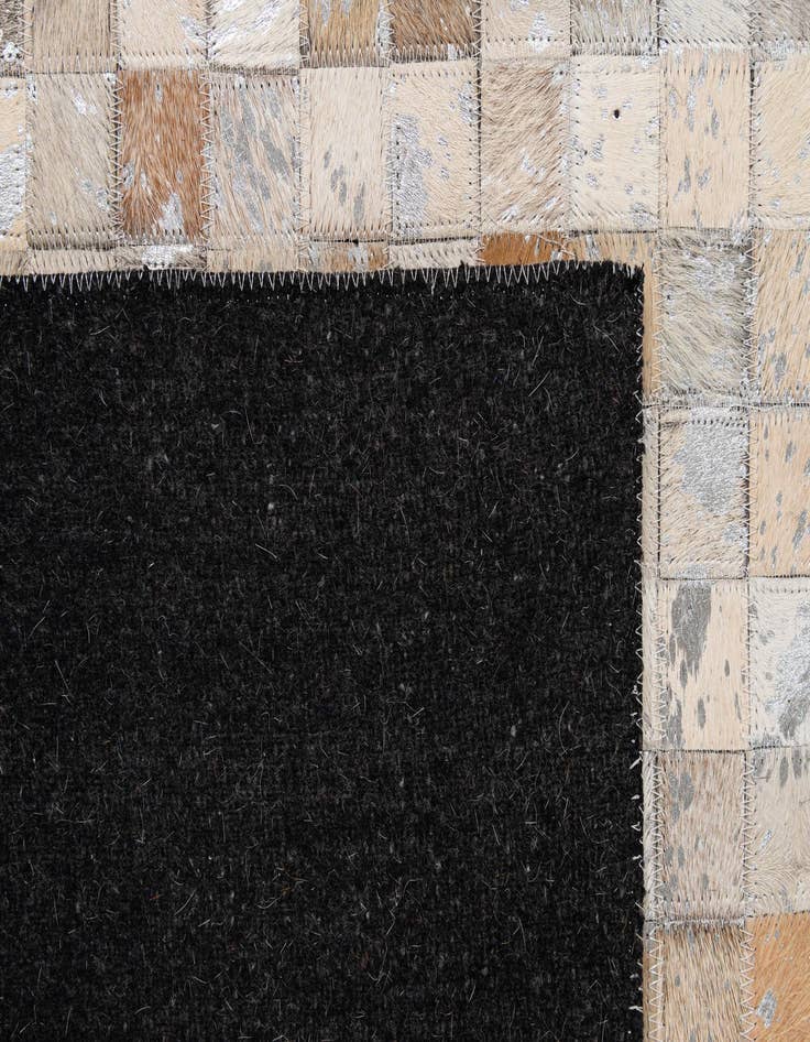 Detail image of  5' 1 x 8' 1 Cowhide - Patchwork Rug