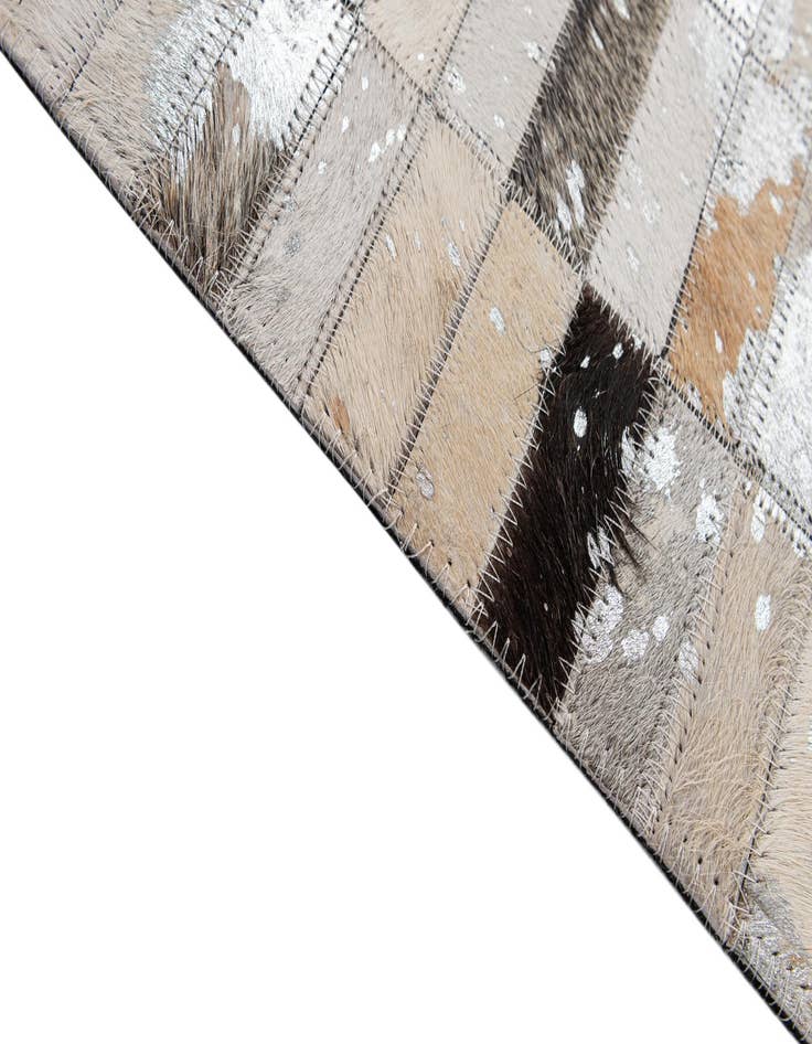 Detail image of  5' 1 x 8' 1 Cowhide - Patchwork Rug