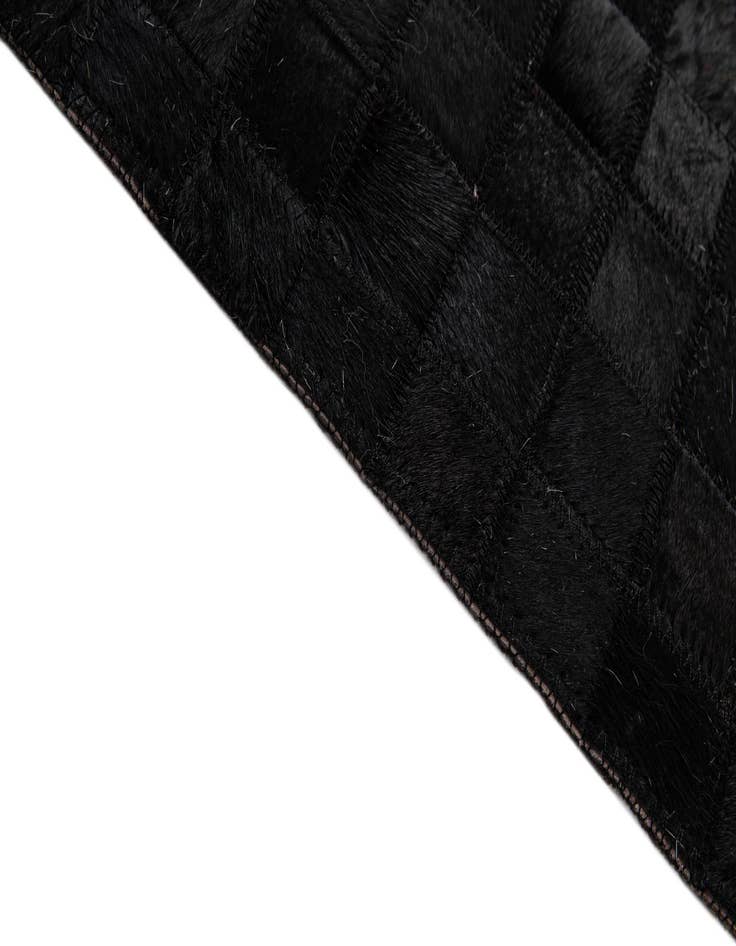 Detail image of  5' 1 x 8' 2 Cowhide - Patchwork Rug