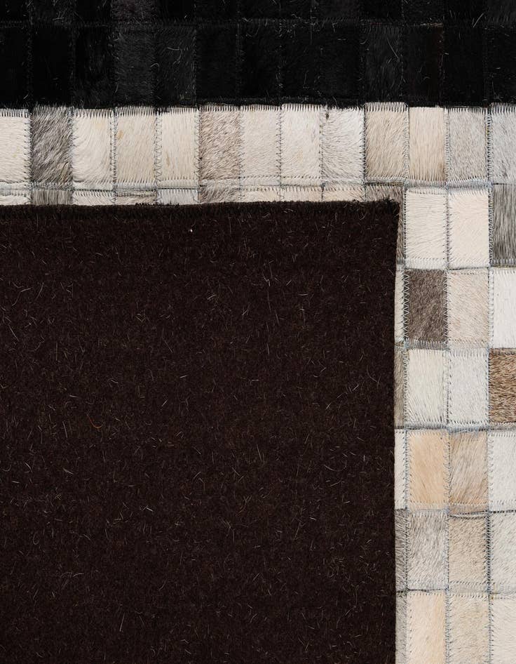 Detail image of  5' 1 x 8' 2 Cowhide - Patchwork Rug