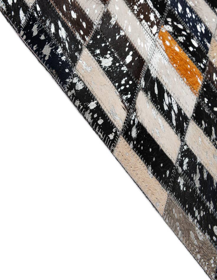 Detail image of  5' 2 x 8' 2 Cowhide - Patchwork Rug