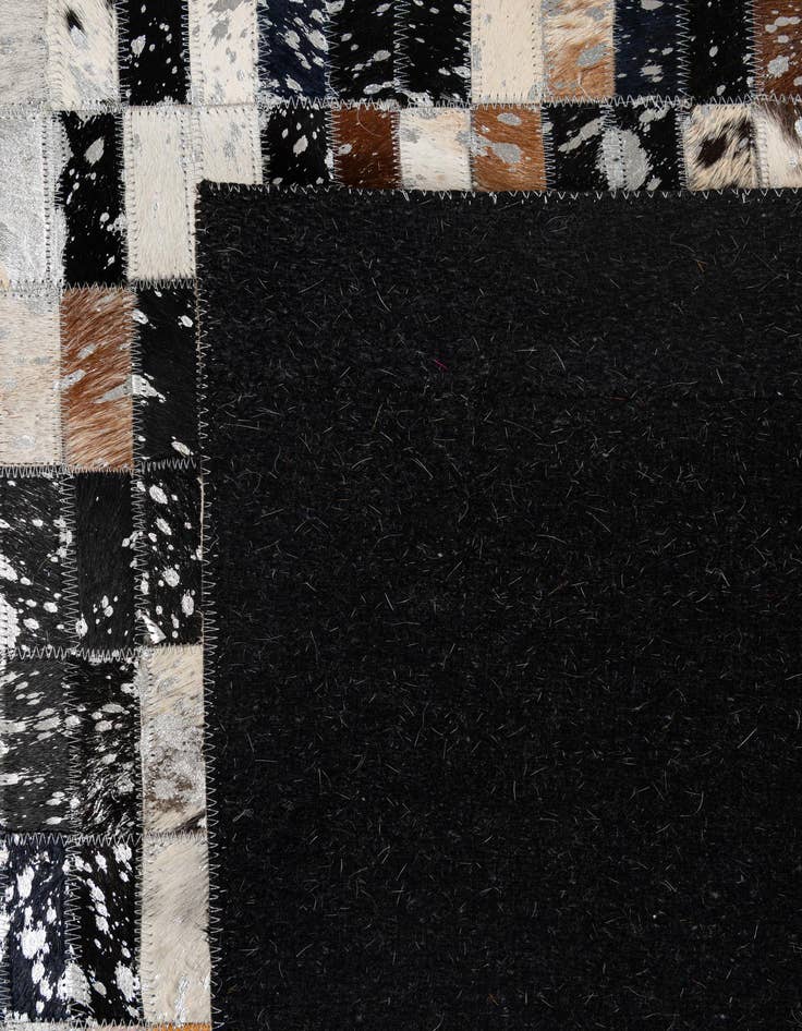 Detail image of  5' 2 x 8' 2 Cowhide - Patchwork Rug