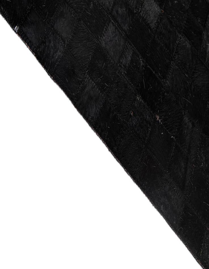 Detail image of  5' 2 x 7' 11 Cowhide - Patchwork Rug