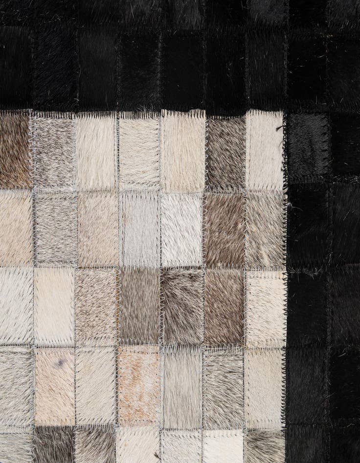 Detail image of  5' 2 x 7' 11 Cowhide - Patchwork Rug