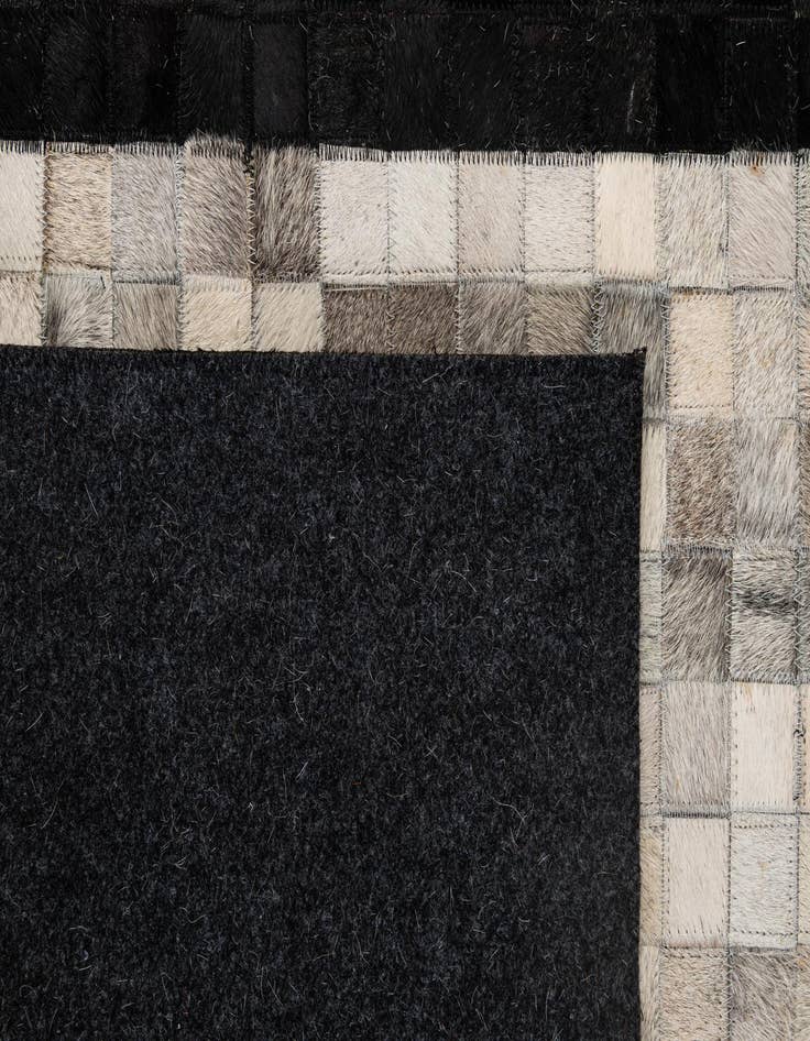 Detail image of  5' 2 x 7' 11 Cowhide - Patchwork Rug