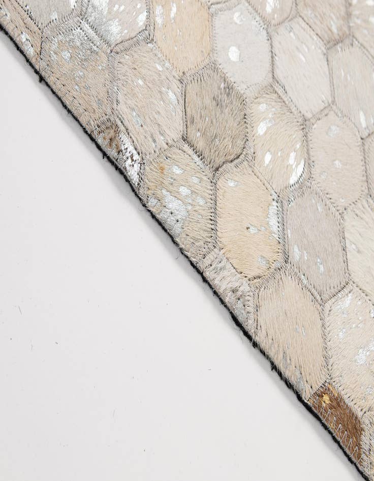 Detail image of  5' 2 x 8' 2 Cowhide - Patchwork Rug
