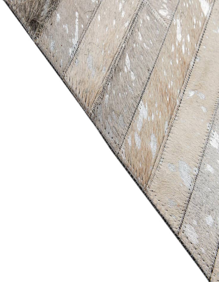 Detail image of  5' 2 x 7' 11 Cowhide - Patchwork Rug