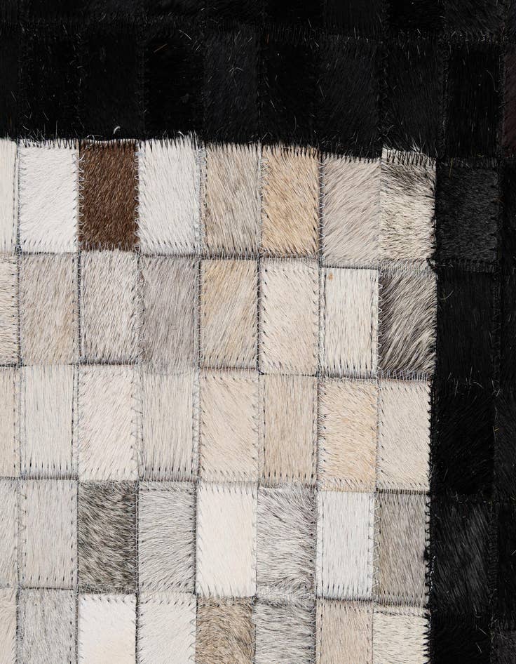 Detail image of  5' 1 x 7' 11 Cowhide - Patchwork Rug