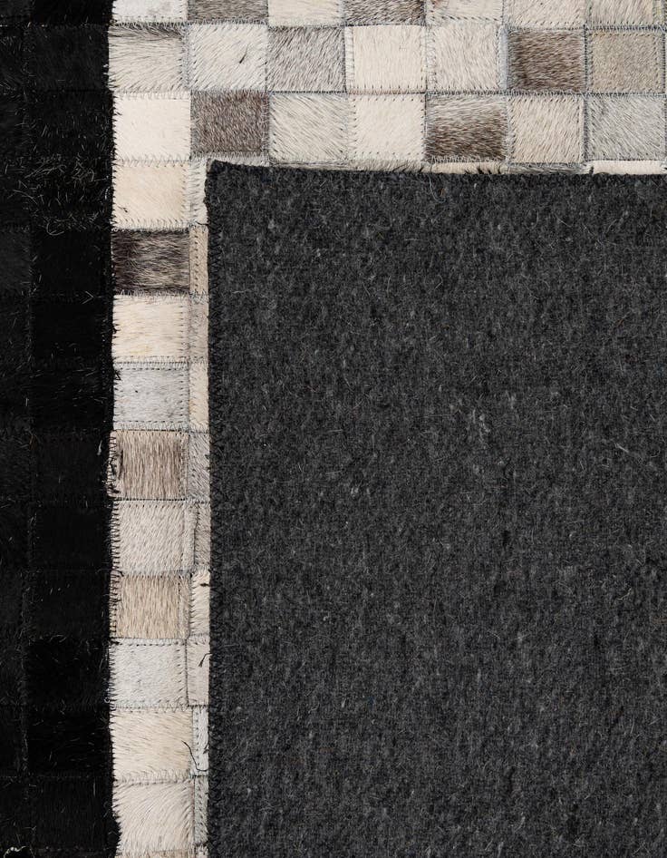 Detail image of  5' 1 x 7' 11 Cowhide - Patchwork Rug
