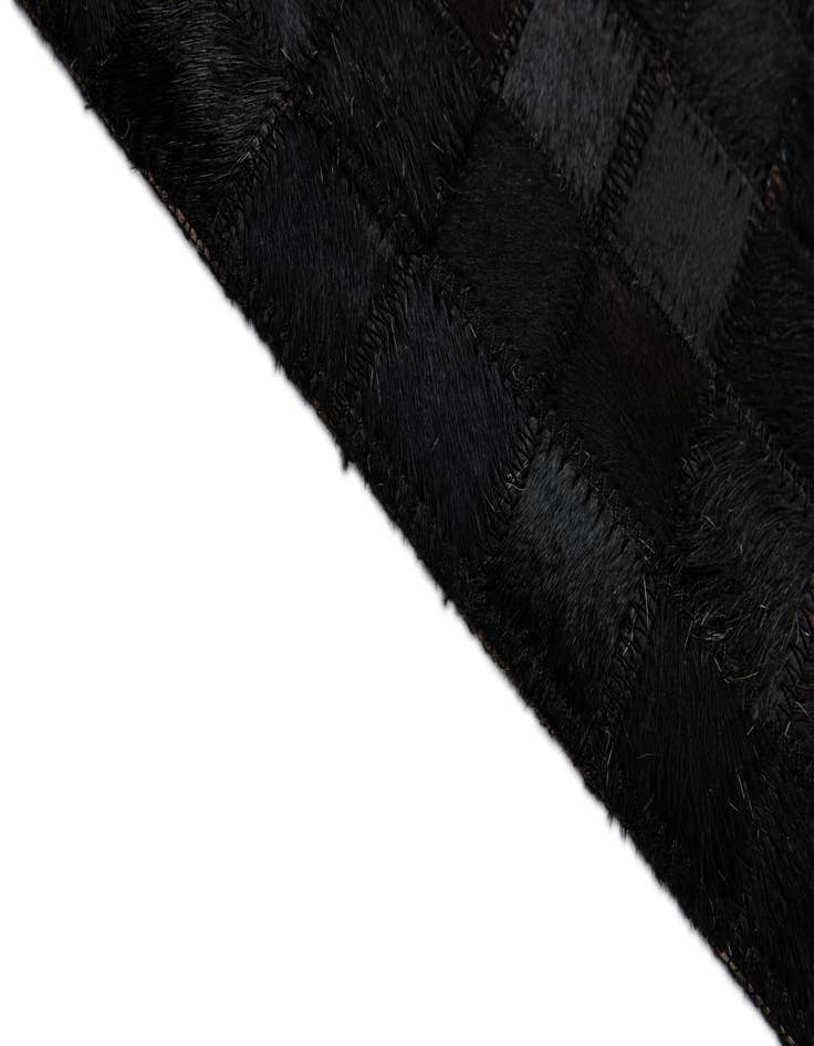 Detail image of  5' 1 x 7' 11 Cowhide - Patchwork Rug