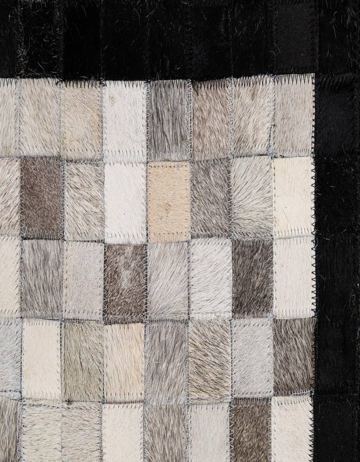Detail image of  5' 1 x 7' 11 Cowhide - Patchwork Rug