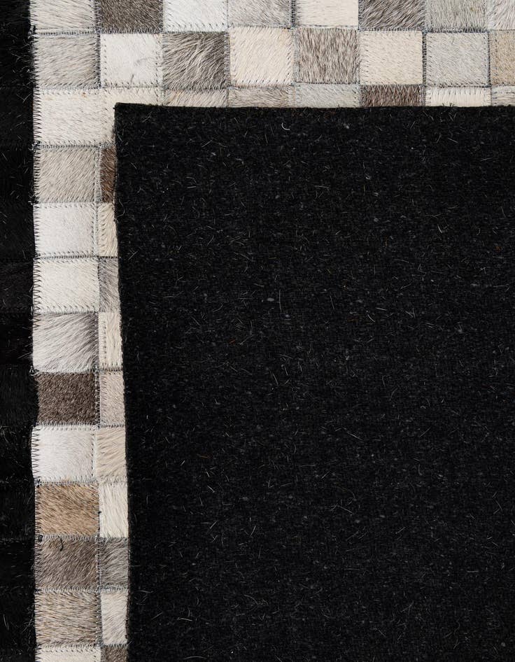 Detail image of  5' 1 x 7' 11 Cowhide - Patchwork Rug