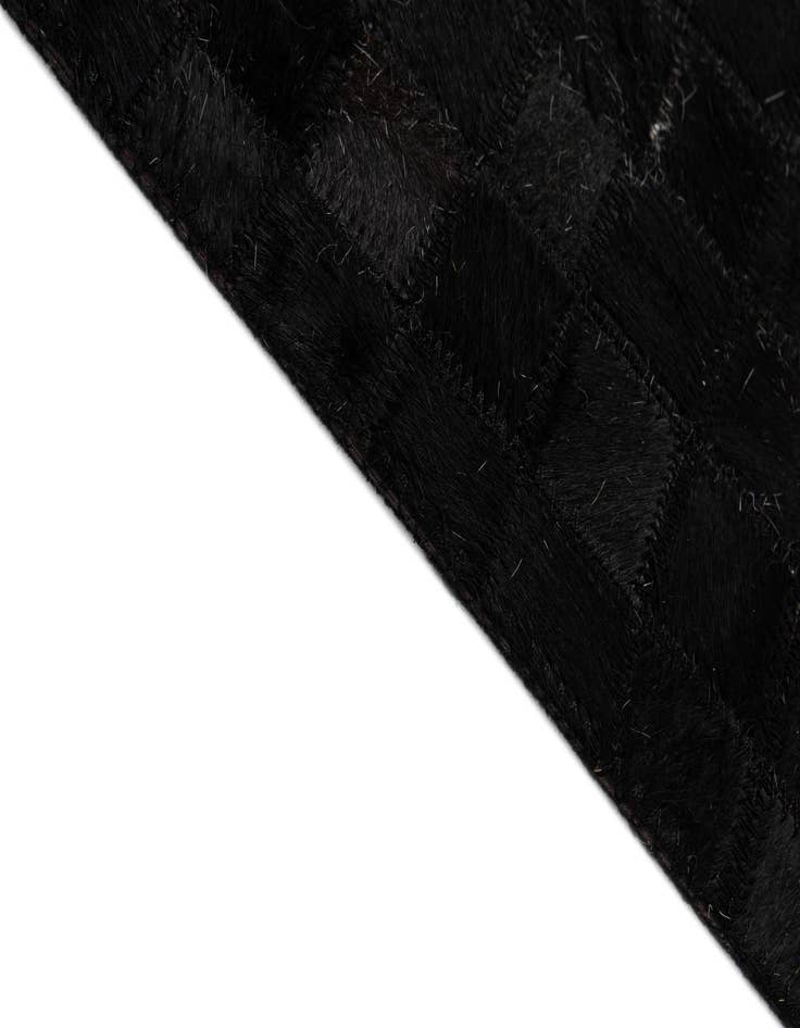 Detail image of  5' x 7' 11 Cowhide - Patchwork Rug