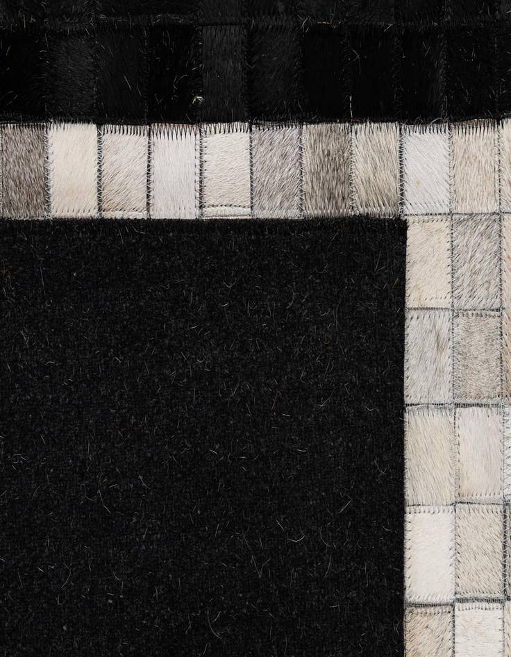 Detail image of  5' x 7' 11 Cowhide - Patchwork Rug