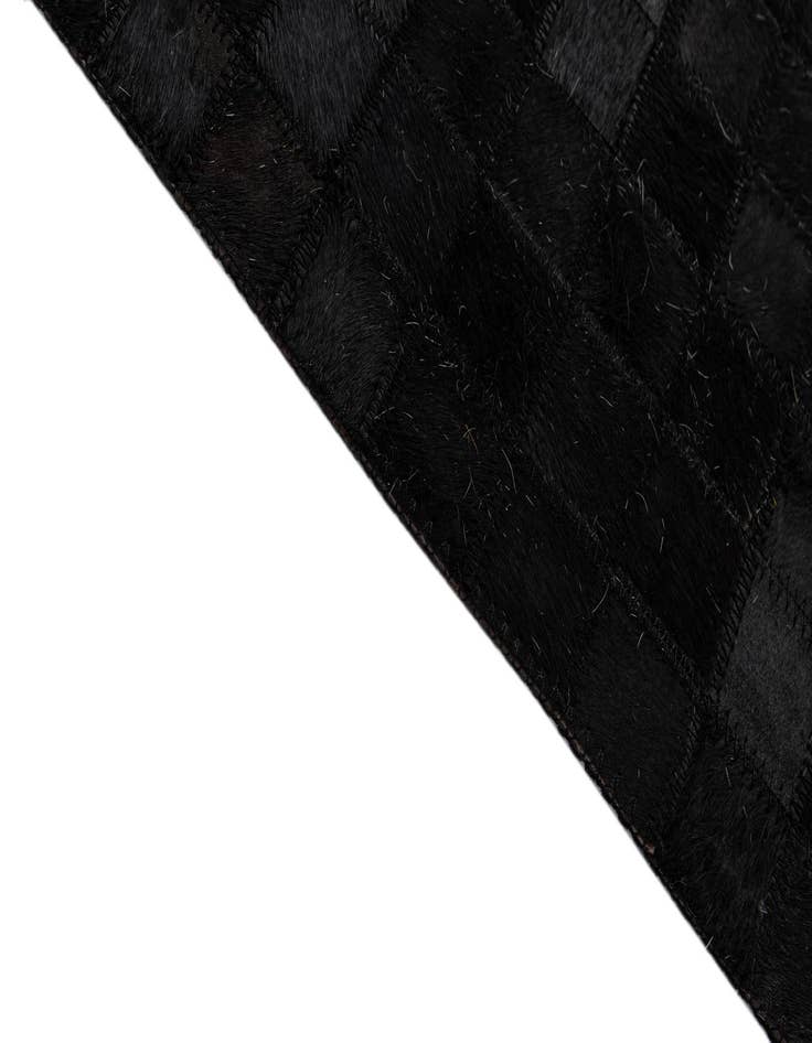 Detail image of  5' 1 x 7' 10 Cowhide - Patchwork Rug