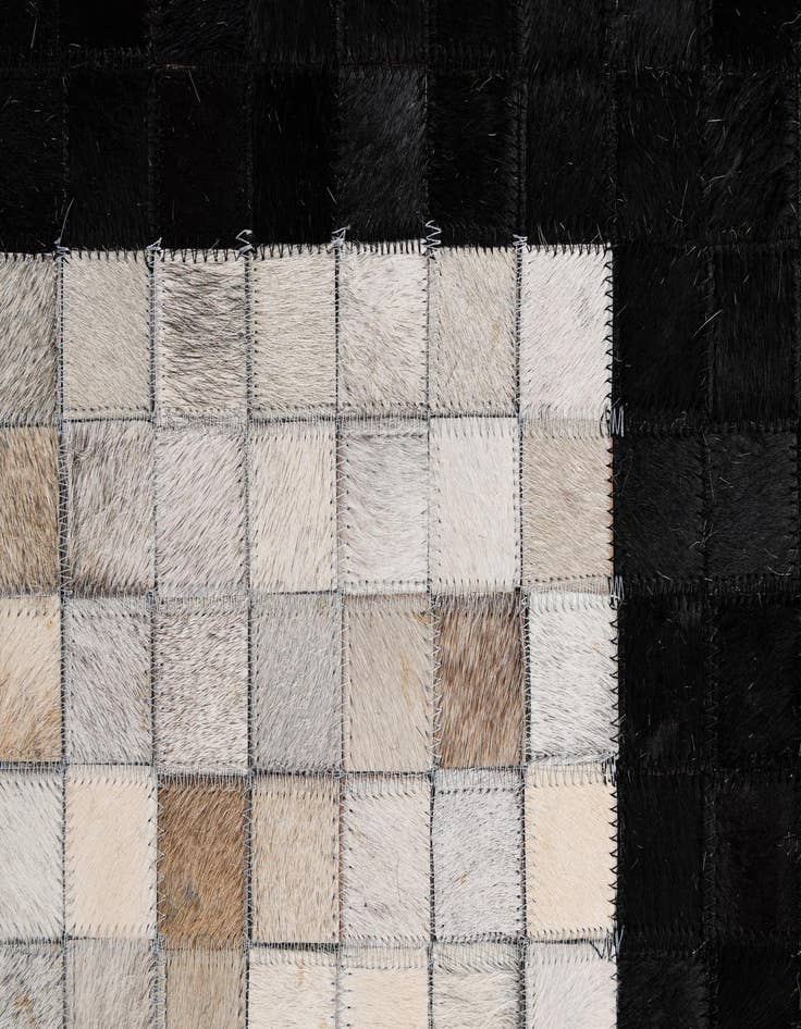Detail image of  5' 1 x 7' 10 Cowhide - Patchwork Rug