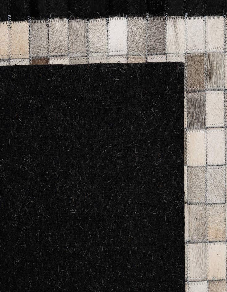 Detail image of  5' 1 x 7' 10 Cowhide - Patchwork Rug