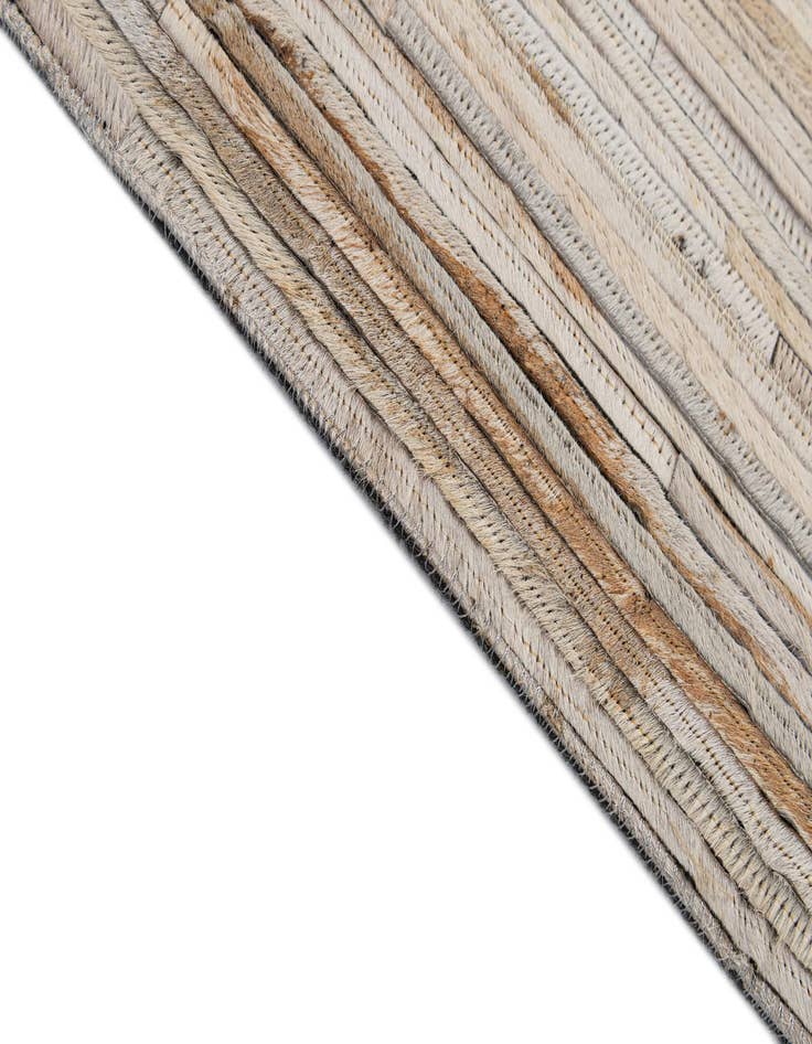 Detail image of  5' 1 x 7' 11 Cowhide - Patchwork Rug