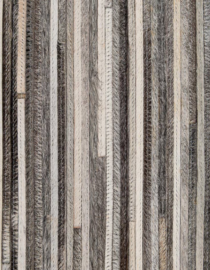 Detail image of  5' 1 x 7' 11 Cowhide - Patchwork Rug