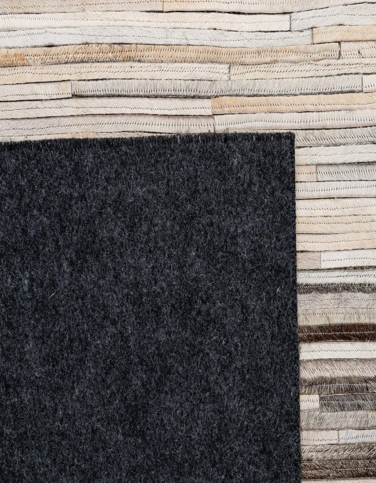 Detail image of  5' 1 x 7' 11 Cowhide - Patchwork Rug