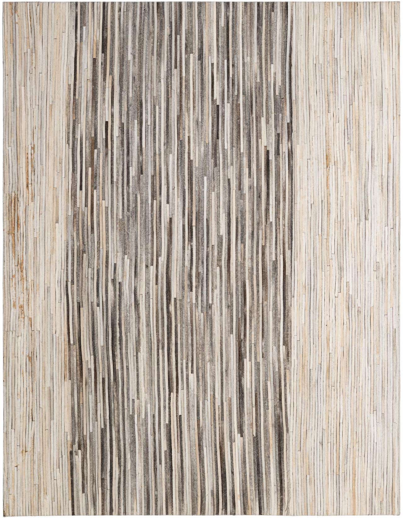 A 5x8 rectangular Cowhide Patchwork rug featuring vertical stripes of varying natural brown, grey, and cream tones.