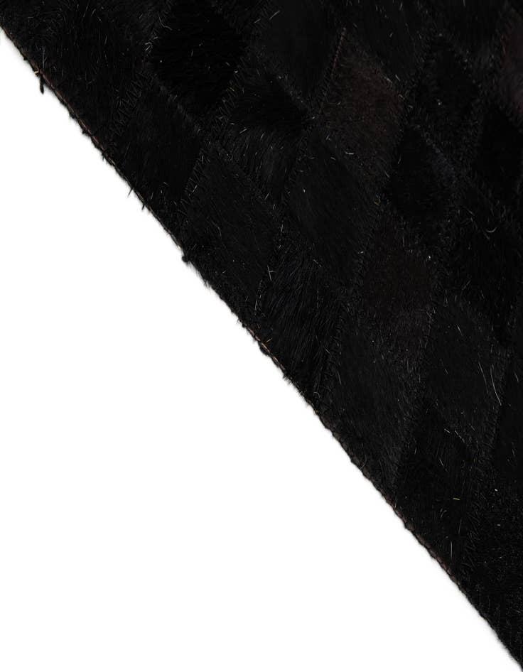 Detail image of  5' x 7' 11 Cowhide - Patchwork Rug