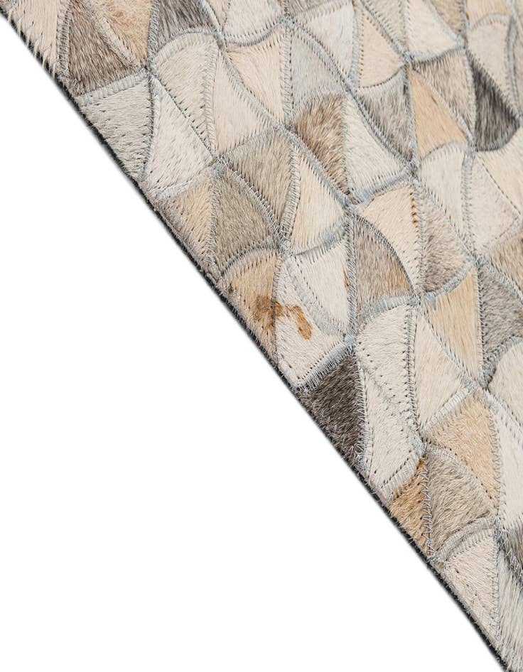 Detail image of  4' 10 x 7' 11 Cowhide - Patchwork Rug