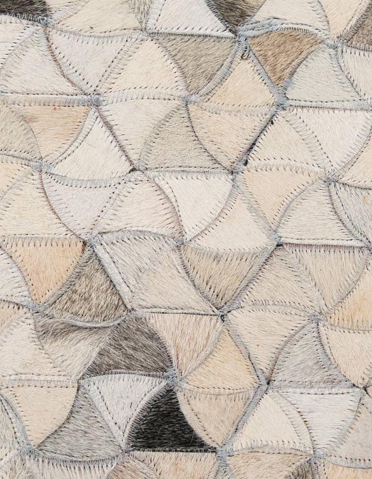Detail image of  4' 10 x 7' 11 Cowhide - Patchwork Rug