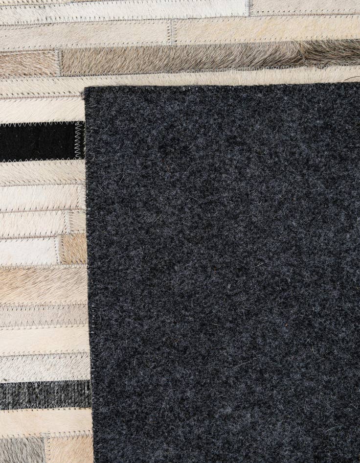 Detail image of  5' 2 x 8' 1 Cowhide - Patchwork Rug