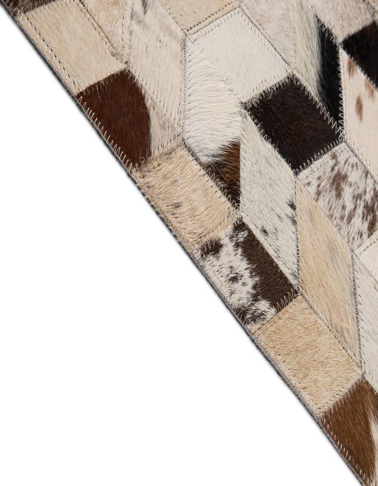 Detail image of  5' 1 x 7' 10 Cowhide - Patchwork Rug