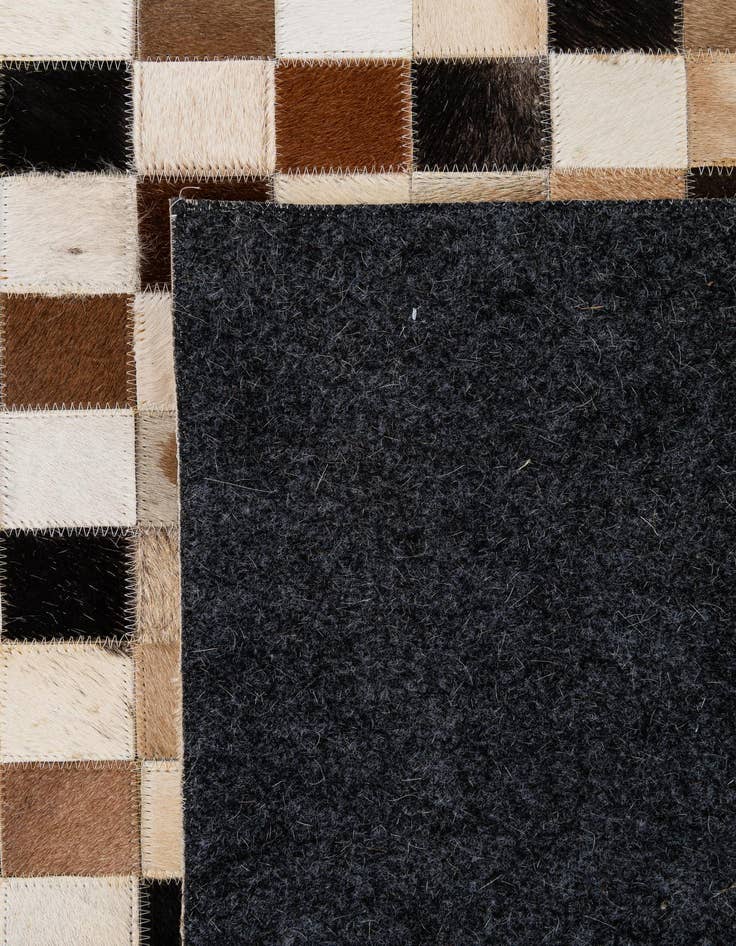 Detail image of  5' 1 x 8' Cowhide - Patchwork Rug
