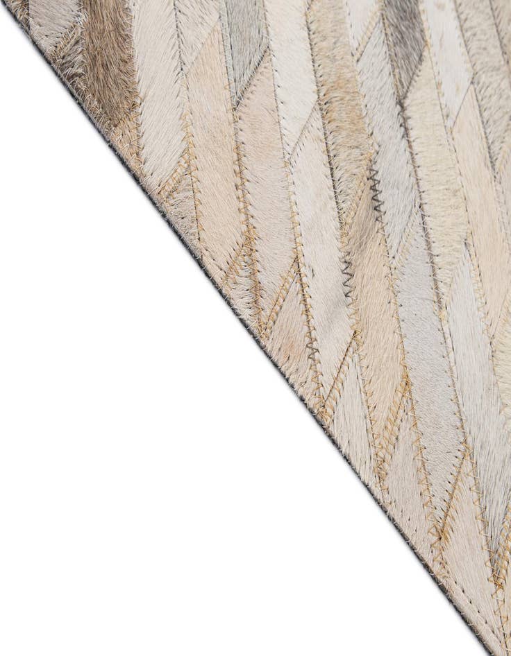 Detail image of  5' 1 x 7' 11 Cowhide - Patchwork Rug