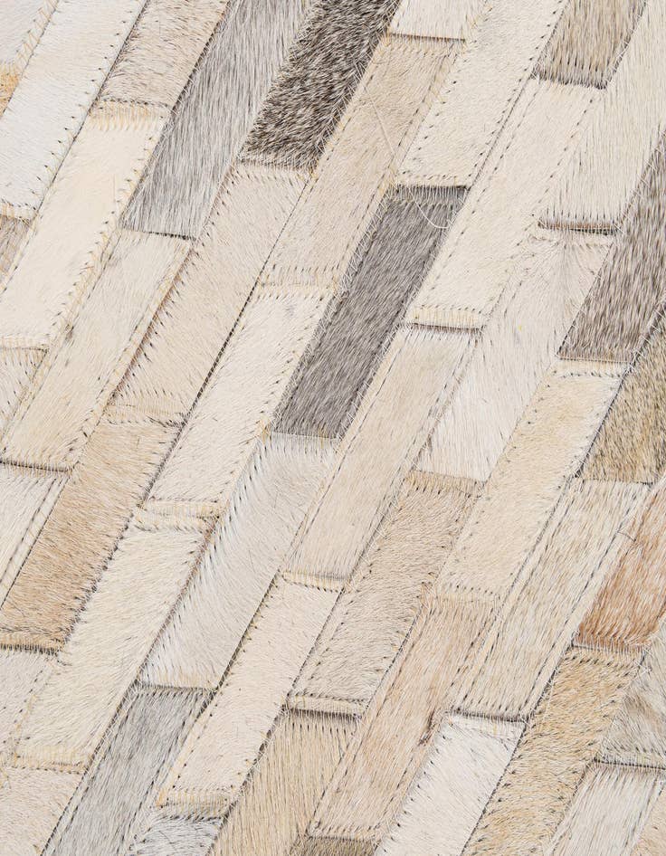 Detail image of  5' 1 x 7' 11 Cowhide - Patchwork Rug