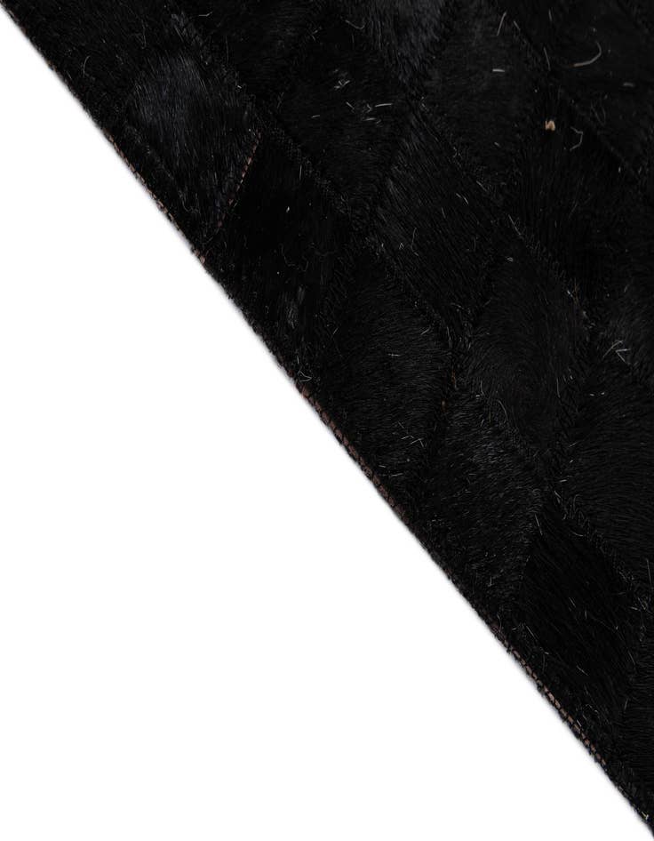 Detail image of  5' x 7' 11 Cowhide - Patchwork Rug