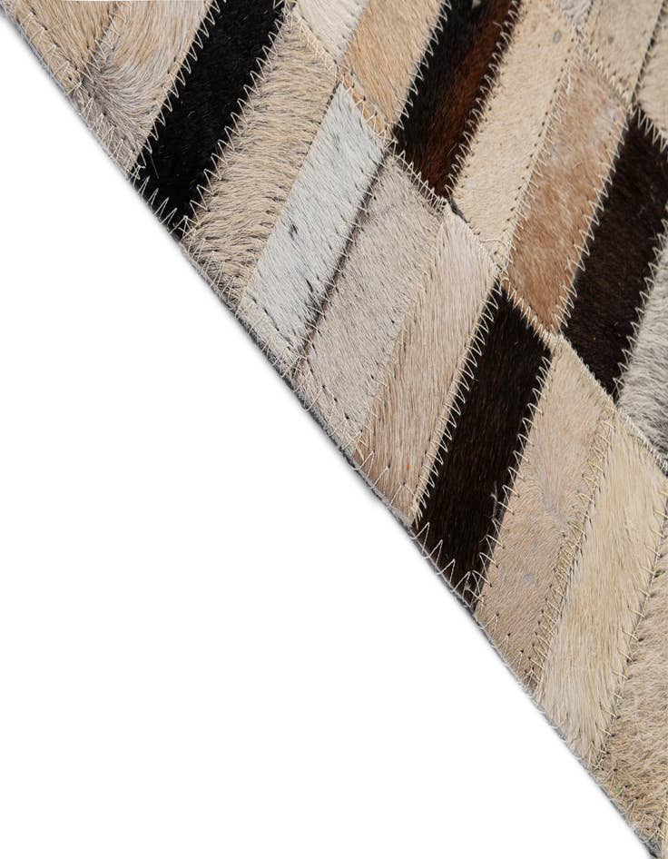 Detail image of  5' 2 x 7' 11 Cowhide - Patchwork Rug