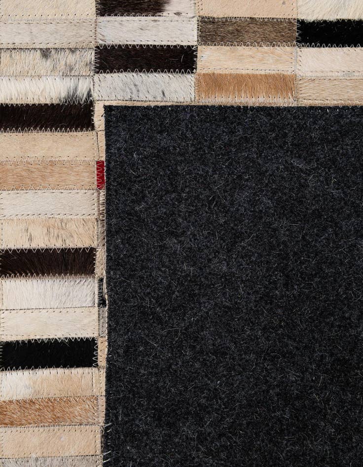 Detail image of  5' 2 x 7' 11 Cowhide - Patchwork Rug