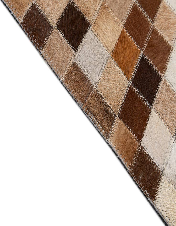 Detail image of  5' x 7' 11 Cowhide - Patchwork Rug