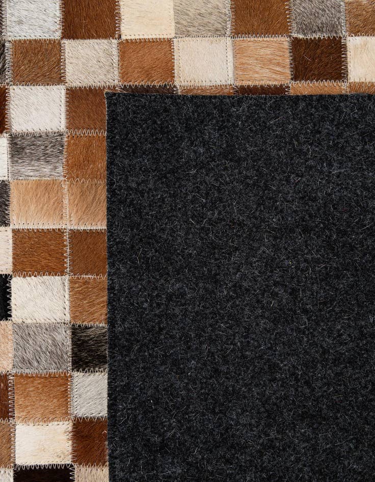 Detail image of  5' x 7' 11 Cowhide - Patchwork Rug