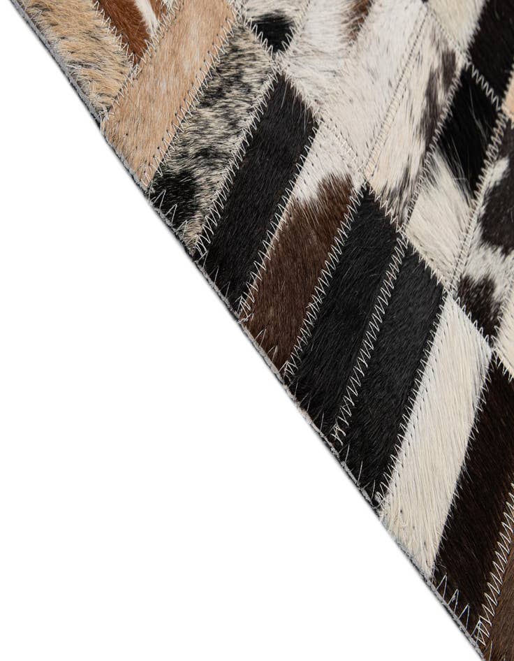 Detail image of  5' x 7' 11 Cowhide - Patchwork Rug