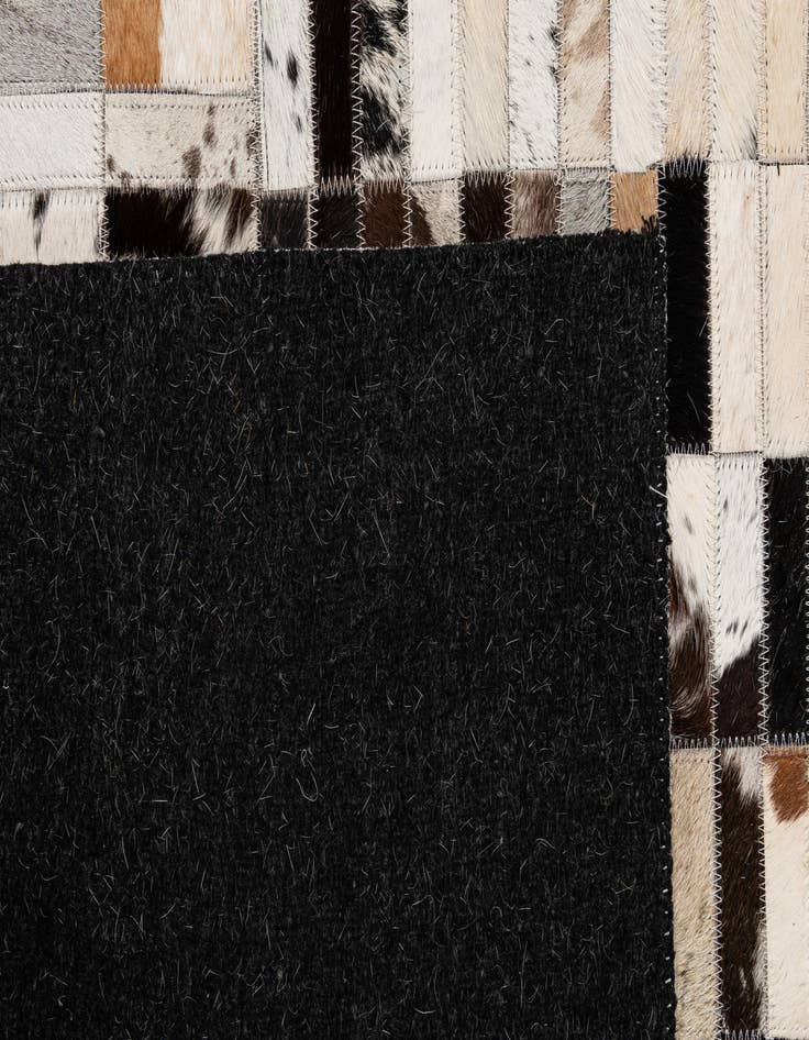 Detail image of  5' x 7' 11 Cowhide - Patchwork Rug
