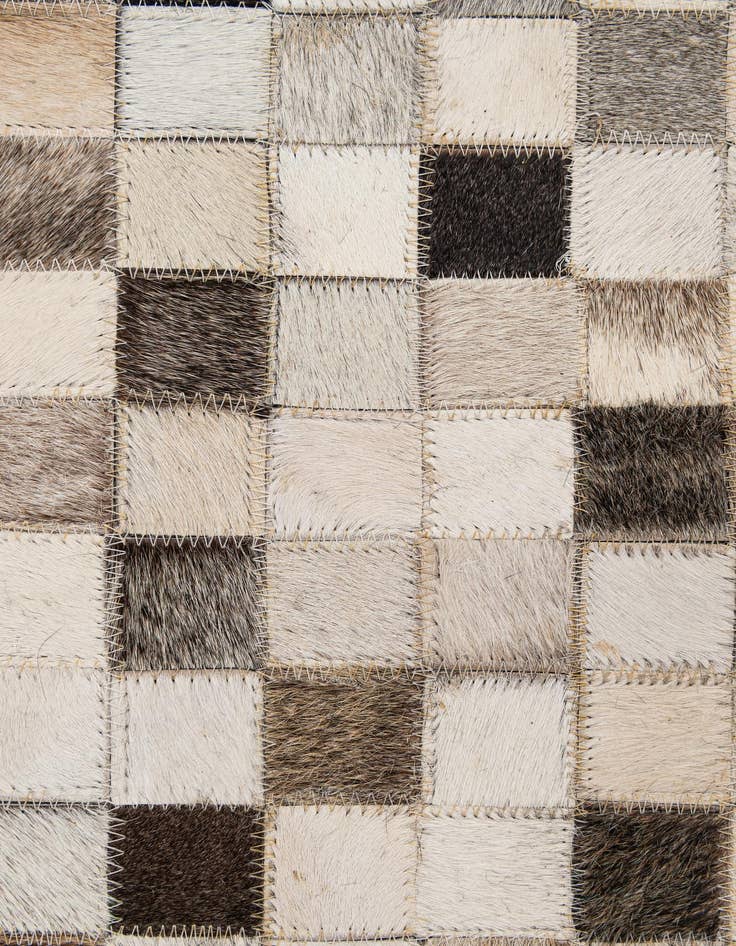 Detail image of  5' 1 x 7' 11 Cowhide - Patchwork Rug