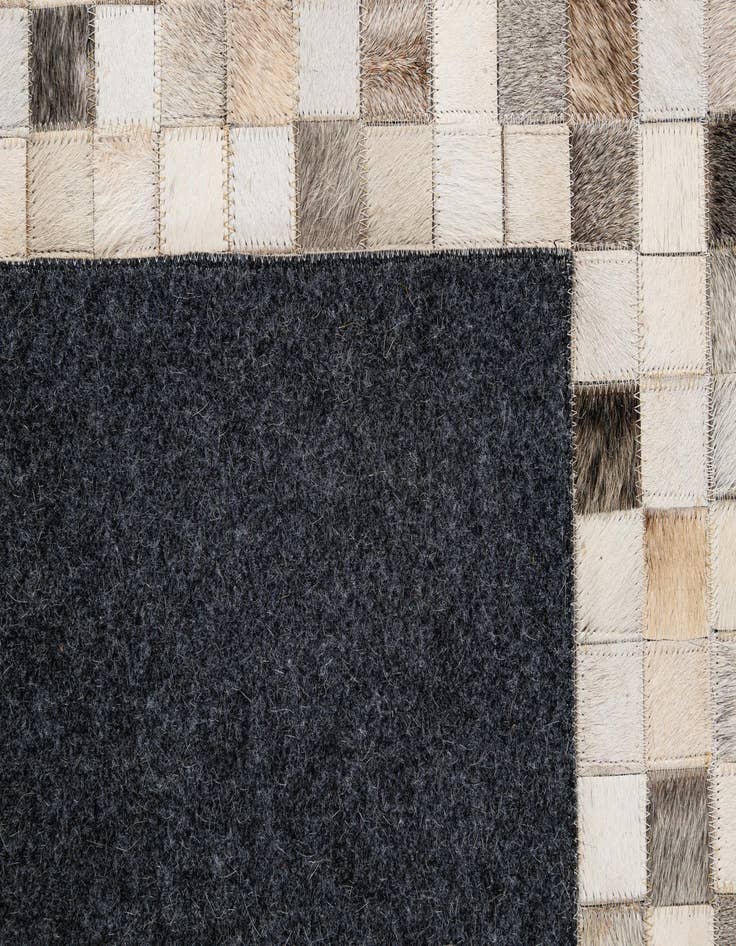 Detail image of  5' 1 x 7' 11 Cowhide - Patchwork Rug