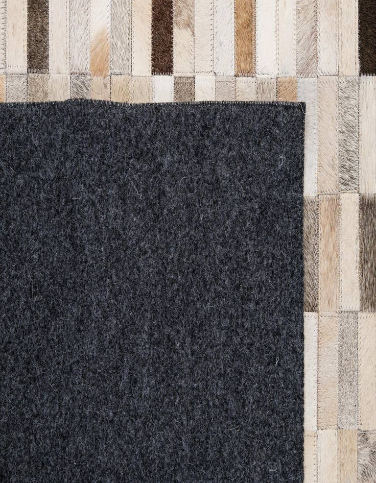Detail image of  5' 2 x 7' 11 Cowhide - Patchwork Rug
