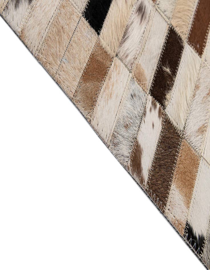 Detail image of  5' 3 x 8' 2 Cowhide - Patchwork Rug