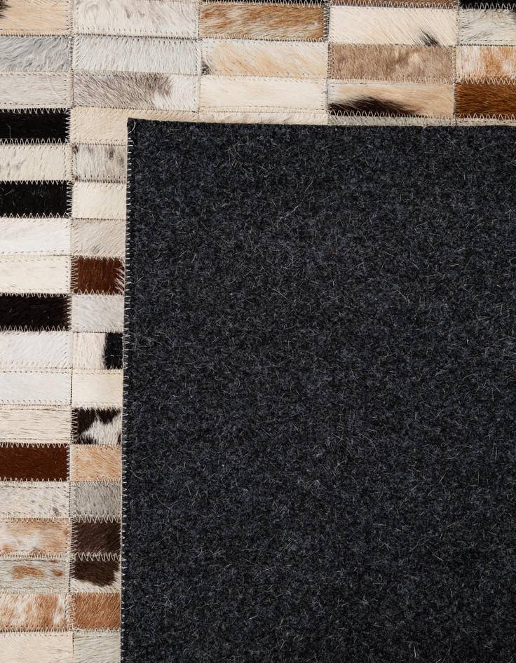 Detail image of  5' 3 x 8' 2 Cowhide - Patchwork Rug